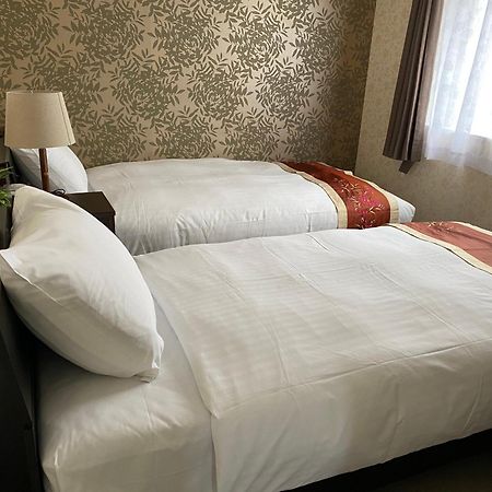 Ocean Front SUMUIDE Appartement Nago Buitenkant foto