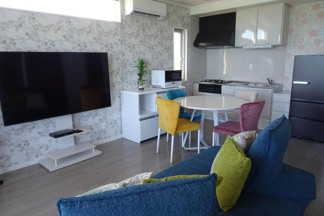 Ocean Front SUMUIDE Appartement Nago Buitenkant foto