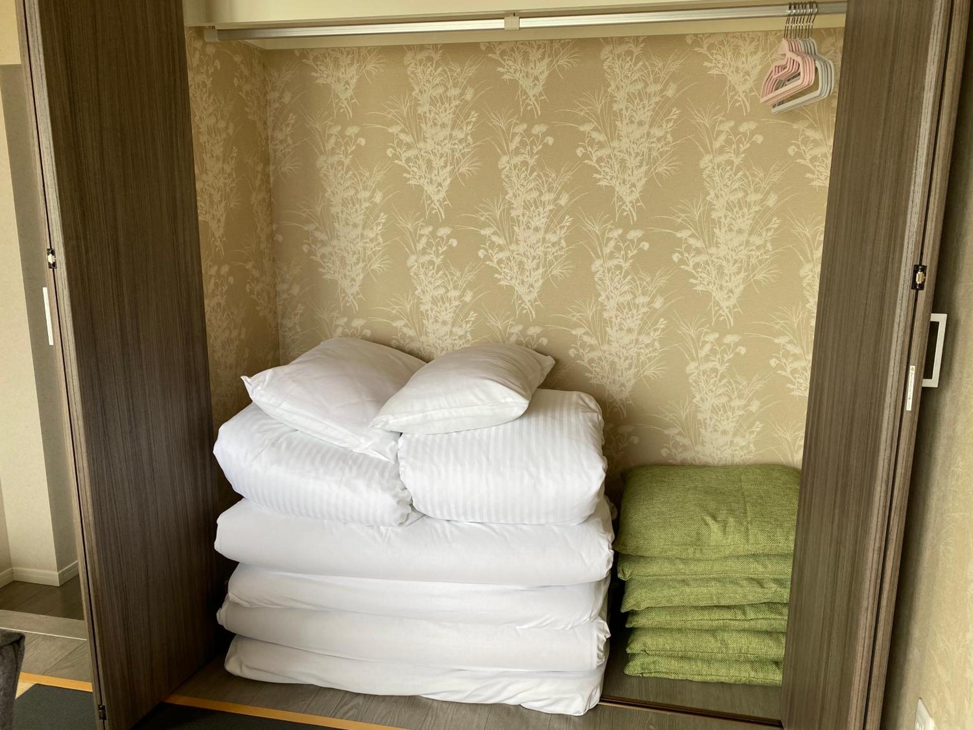 Ocean Front SUMUIDE Appartement Nago Buitenkant foto