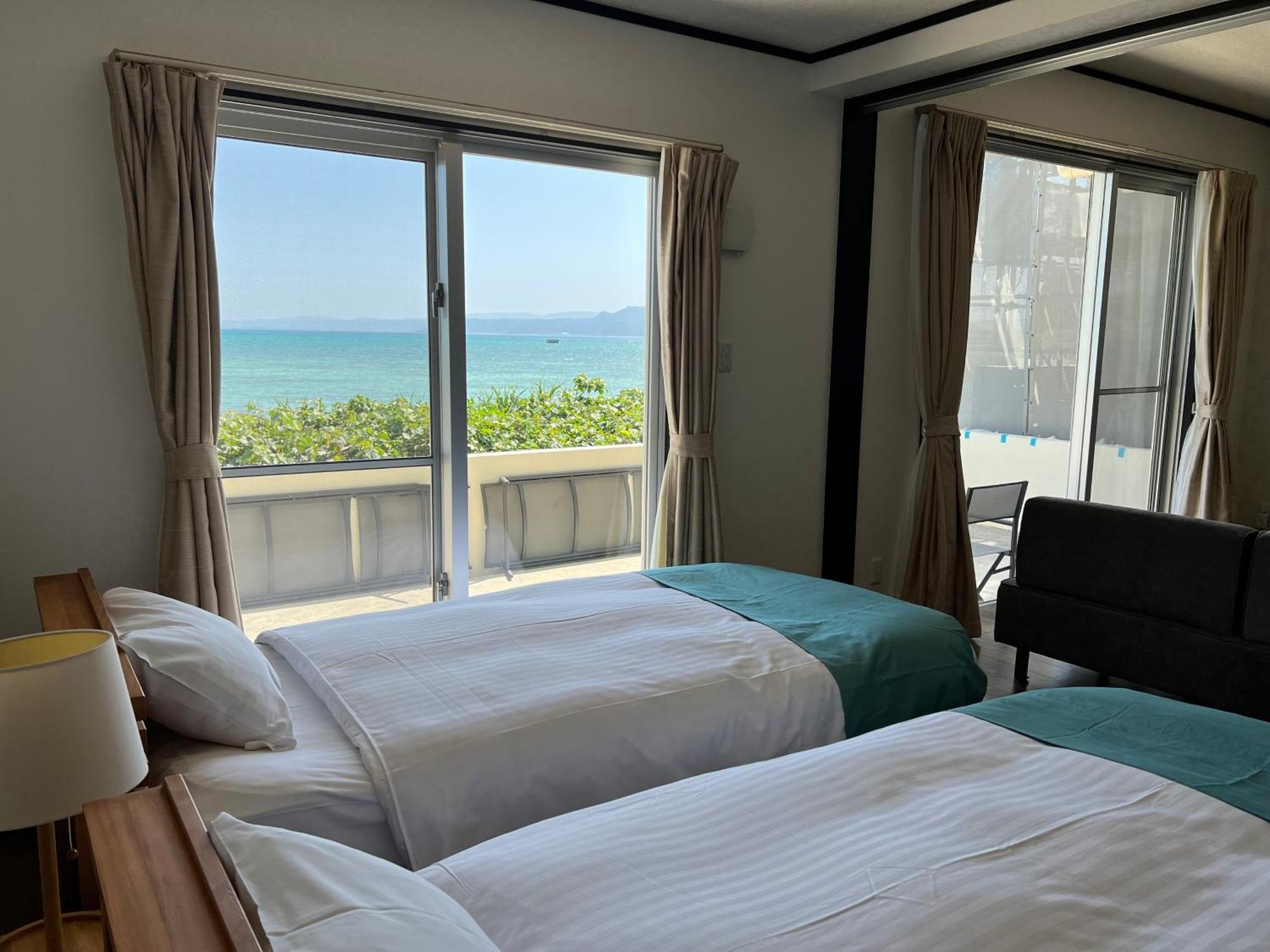 Ocean Front SUMUIDE Appartement Nago Buitenkant foto