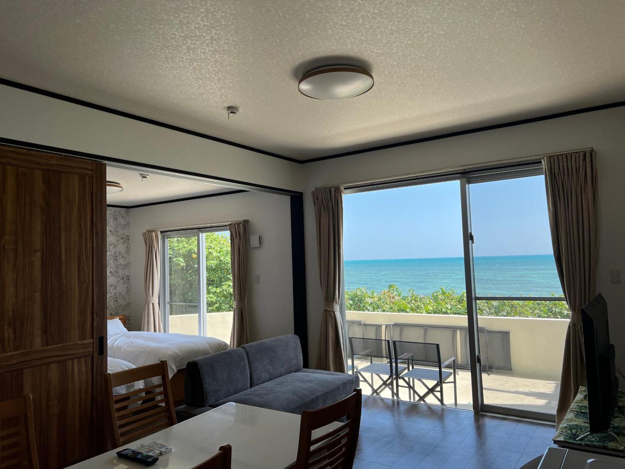 Ocean Front SUMUIDE Appartement Nago Buitenkant foto