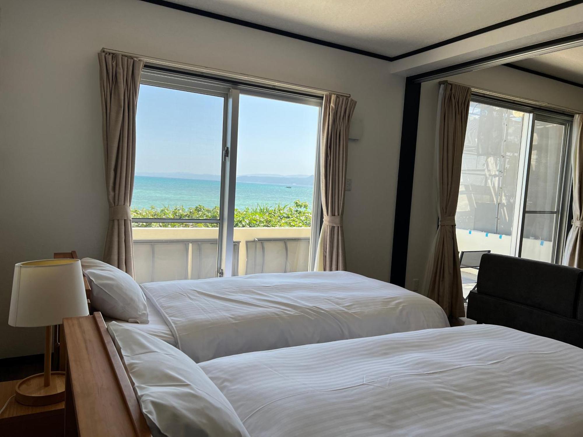 Ocean Front SUMUIDE Appartement Nago Buitenkant foto