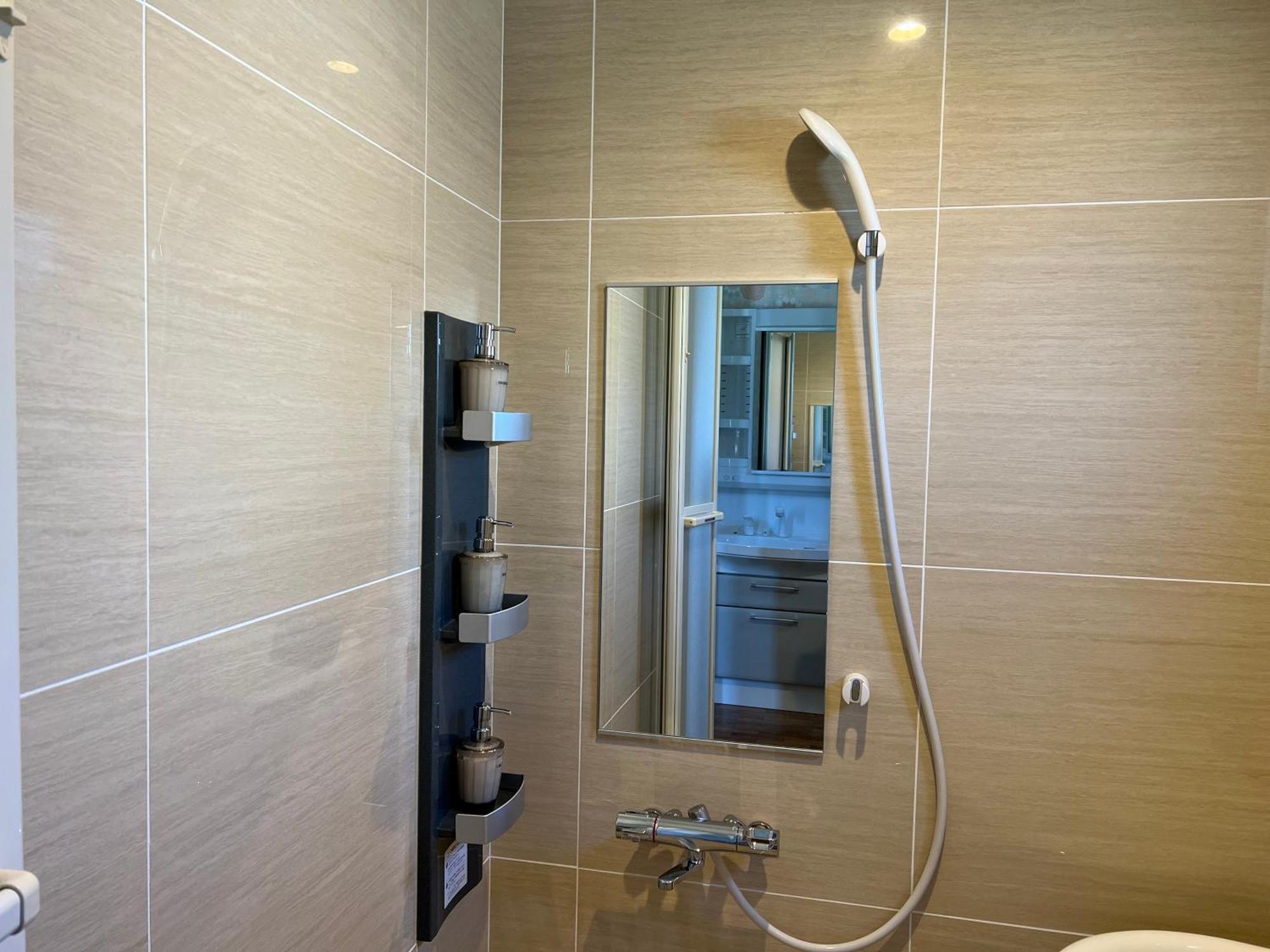 Ocean Front SUMUIDE Appartement Nago Buitenkant foto